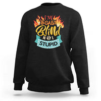 Black crewneck sweatshirt with front graphic “I’m legally blind not stupid”