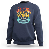 Navy crewneck sweatshirt with front graphic “I’m legally blind not stupid”
