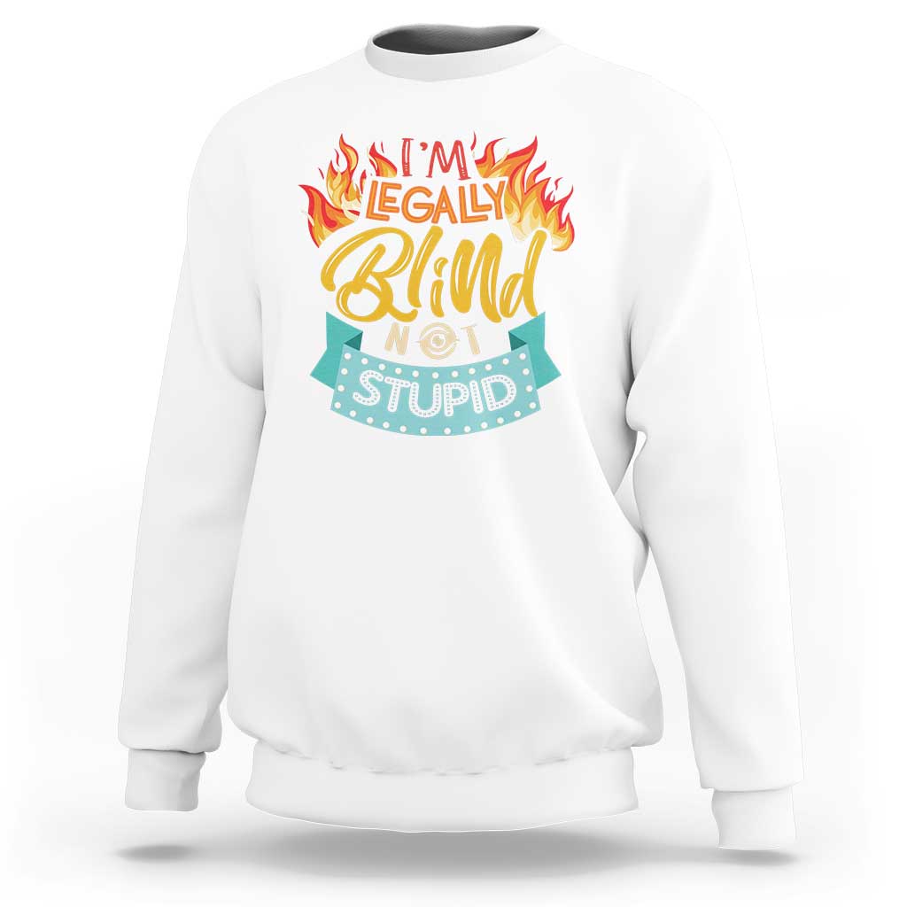 White crewneck sweatshirt with front graphic “I’m legally blind not stupid”