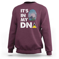 Maroon sweatshirt with 'IT'S IN MY DNA' text and fingerprint graphic on back