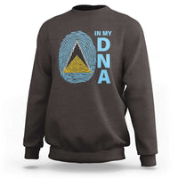 Dark chocolate crewneck sweatshirt with “IN MY DNA” fingerprint graphic and layered triangle