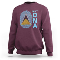 Maroon crewneck sweatshirt with “IN MY DNA” fingerprint graphic and layered triangle