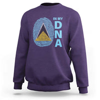 Purple crewneck sweatshirt with “IN MY DNA” fingerprint graphic and layered triangle