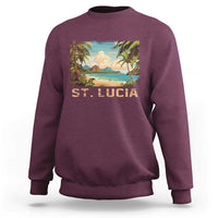 Maroon crewneck sweatshirt with St. Lucia beach graphic on front