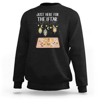 Black Ramadan sweatshirt with “JUST HERE FOR THE IFTAR” text and lantern graphic
