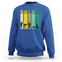 Royal blue sweatshirt with 'SALAH' graphic print and prayer silhouette on the chest