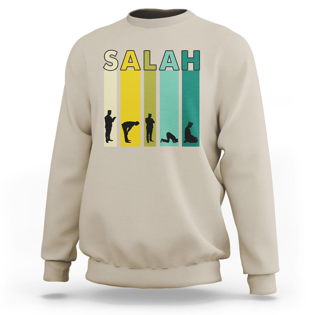 Sand beige sweatshirt with 'SALAH' graphic print and prayer silhouette on the chest