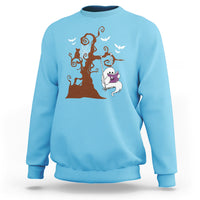 Sky blue sweatshirt with orange Halloween tree and cute ghost reading book graphic.