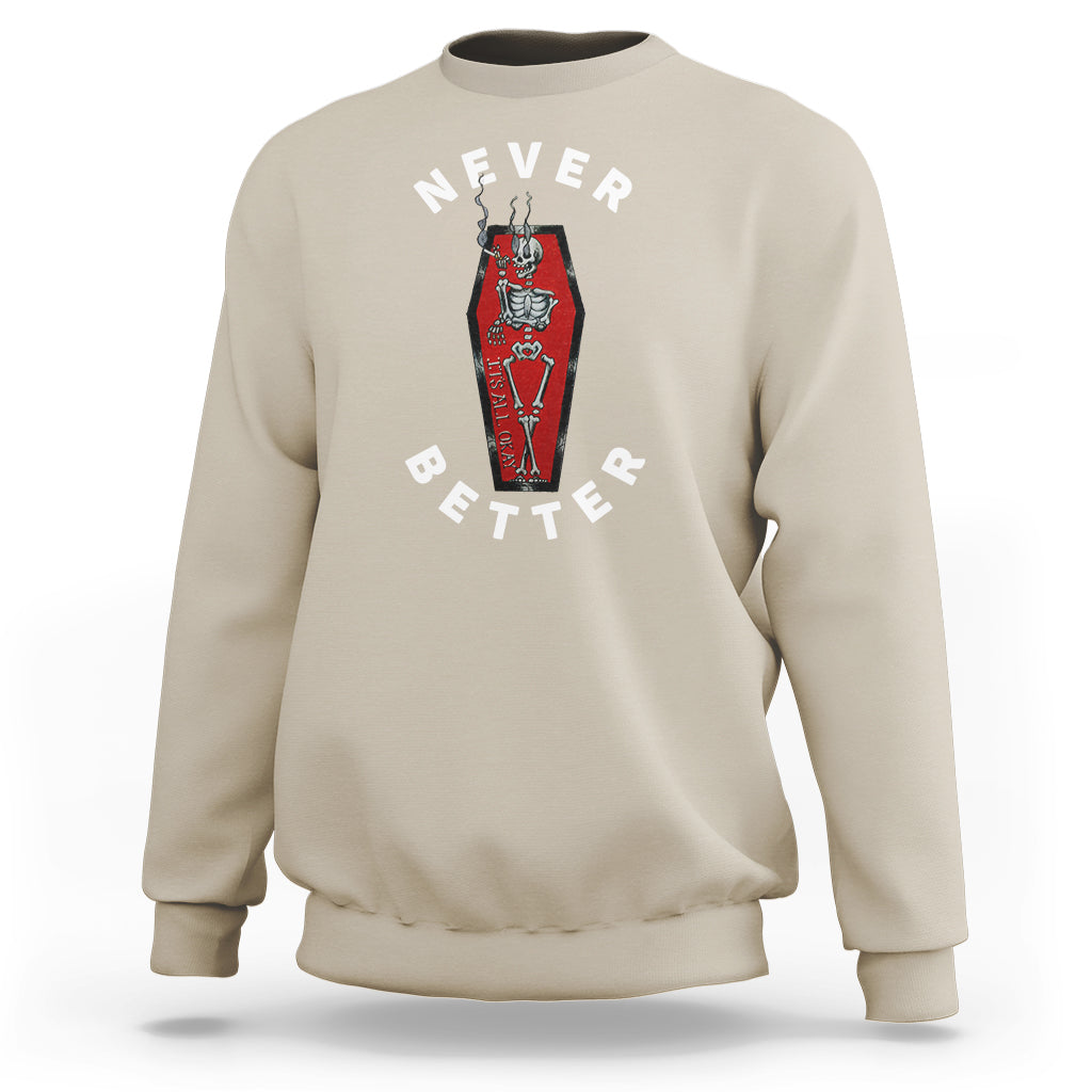 Sand beige crewneck sweatshirt with “Never Better” coffin skeleton graphic on chest