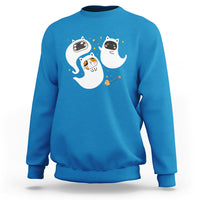 Teal crewneck sweatshirt with cute ghost and cat graphic on chest