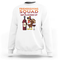 White crewneck sweatshirt with Friendsgiving Squad graphic and turkey holding wine glass