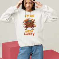 White Thanksgiving sweatshirt with dabbing turkey graphic and "Queen Turkey" text