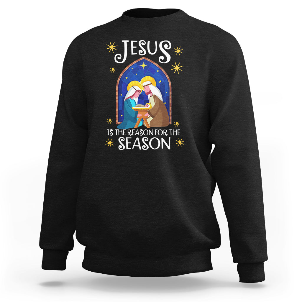 Black crewneck Christmas nativity sweatshirt with colorful Jesus message graphic