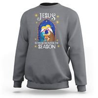 Charcoal gray crewneck Christmas nativity sweatshirt with colorful Jesus message graphic