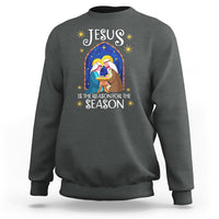 Dark heather gray crewneck Christmas nativity sweatshirt with colorful Jesus message graphic