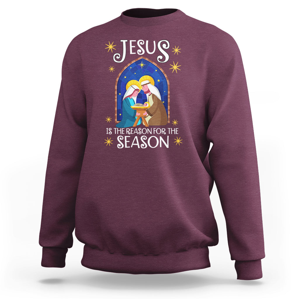 Maroon crewneck Christmas nativity sweatshirt with colorful Jesus message graphic