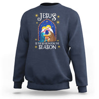Navy crewneck Christmas nativity sweatshirt with colorful Jesus message graphic