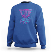 Adventure camping sweatshirt, royal blue, with neon triangle tree graphic.