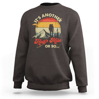Charcoal crewneck sweatshirt with hiking climber graphic on the front