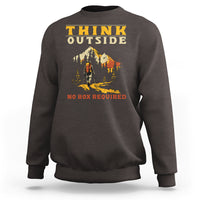Charcoal crewneck sweatshirt with outdoor graphic; 'Think Outside' & 'No Box Required'.