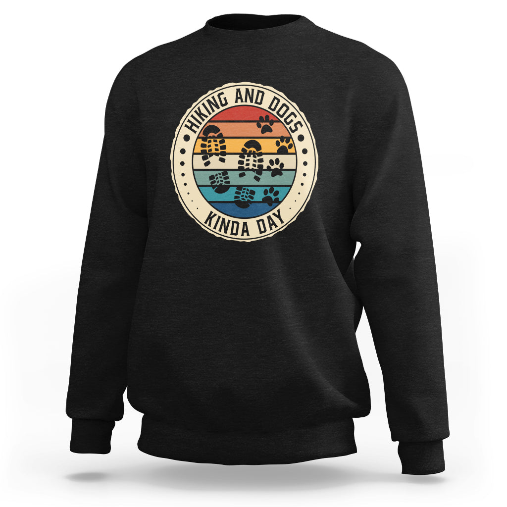 Black crewneck sweatshirt with round hiking and dog graphic, ribbed cuffs and hem.