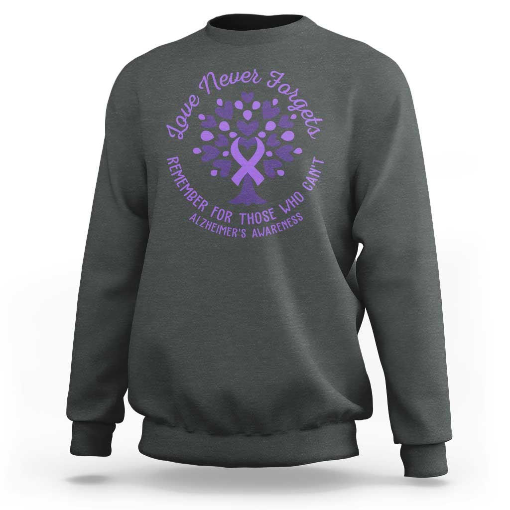 Dark heather gray sweatshirt with purple Alzheimer awareness heart snowflake graphic and text