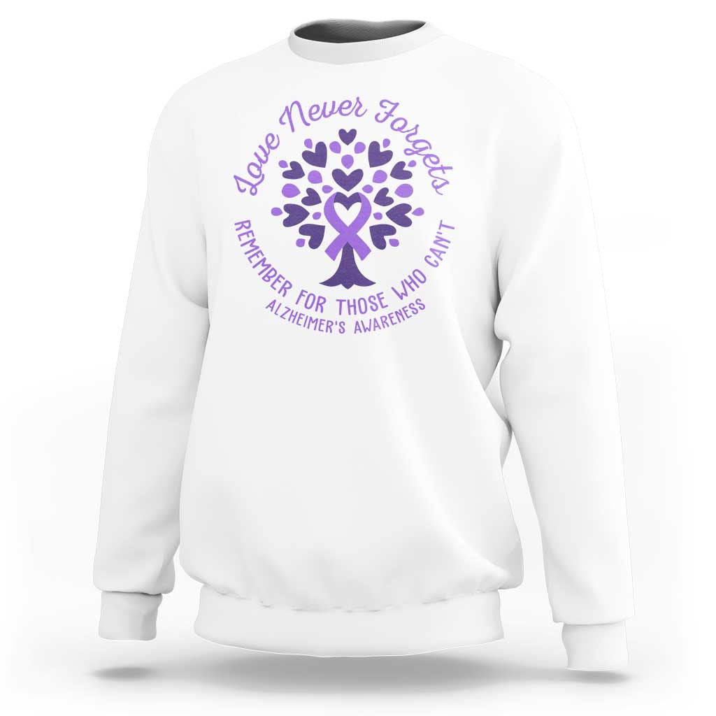 White sweatshirt with purple Alzheimer awareness heart snowflake graphic and text