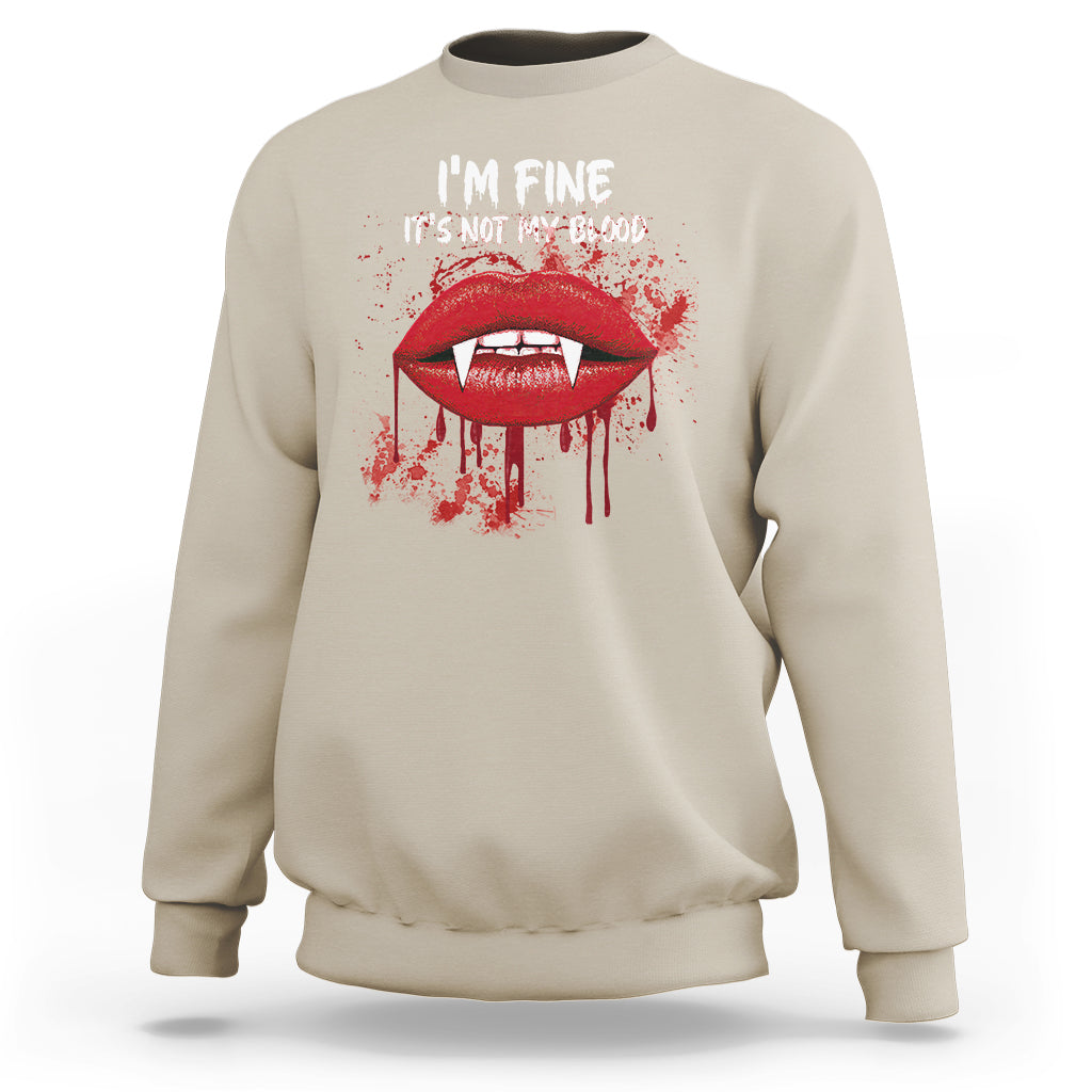 Sand beige vampire lip graphic sweatshirt with “I’m fine, It’s not my blood” text