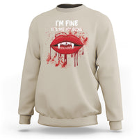 Sand beige vampire lip graphic sweatshirt with “I’m fine, It’s not my blood” text