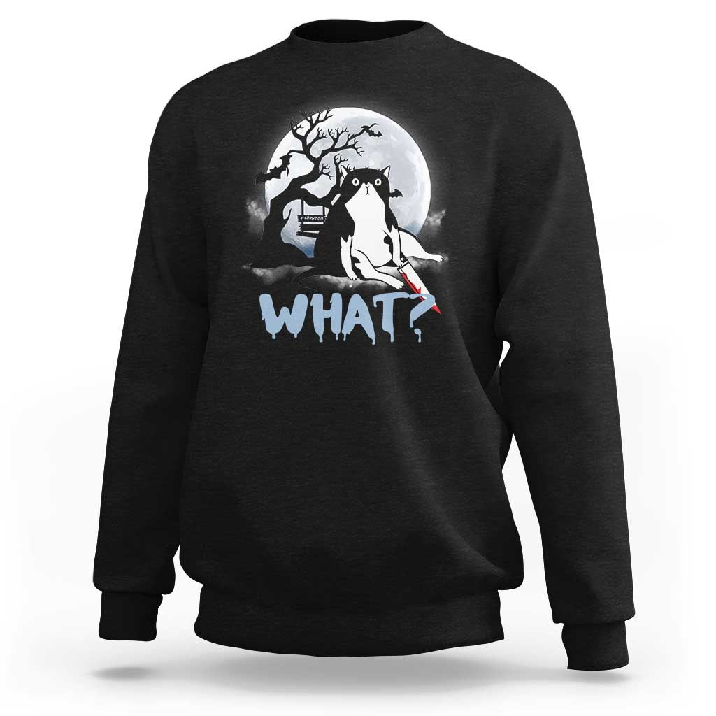 Black crewneck sweatshirt with long sleeves; cat graphic and "WHAT?" print at chest.