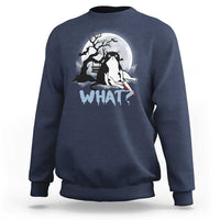 Navy crewneck sweatshirt with long sleeves; cat graphic and "WHAT?" print at chest.