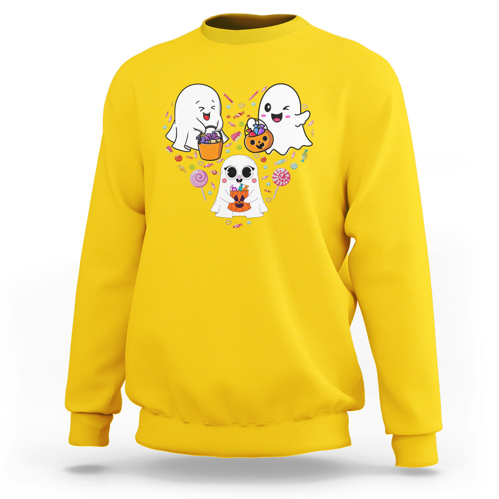 Yellow crewneck sweatshirt with three cute ghosts and candy swirl graphic