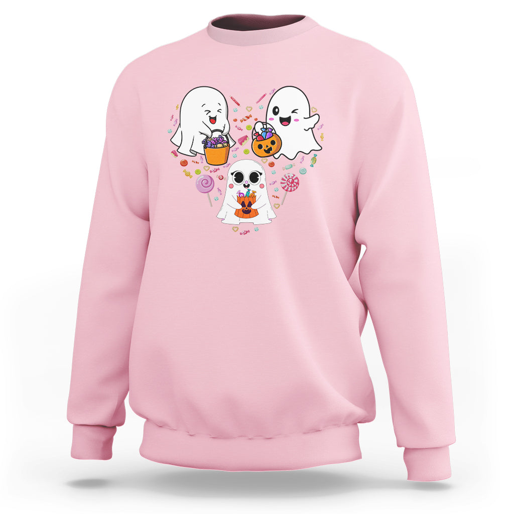 Pink crewneck sweatshirt with cute ghost trio and candy swirl graphic