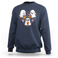Dark blue crewneck sweatshirt with cute ghost trio and candy swirl graphic