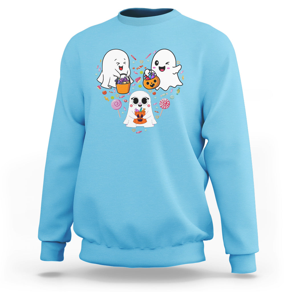 Light blue crewneck sweatshirt with cute ghost trio and candy swirl graphic