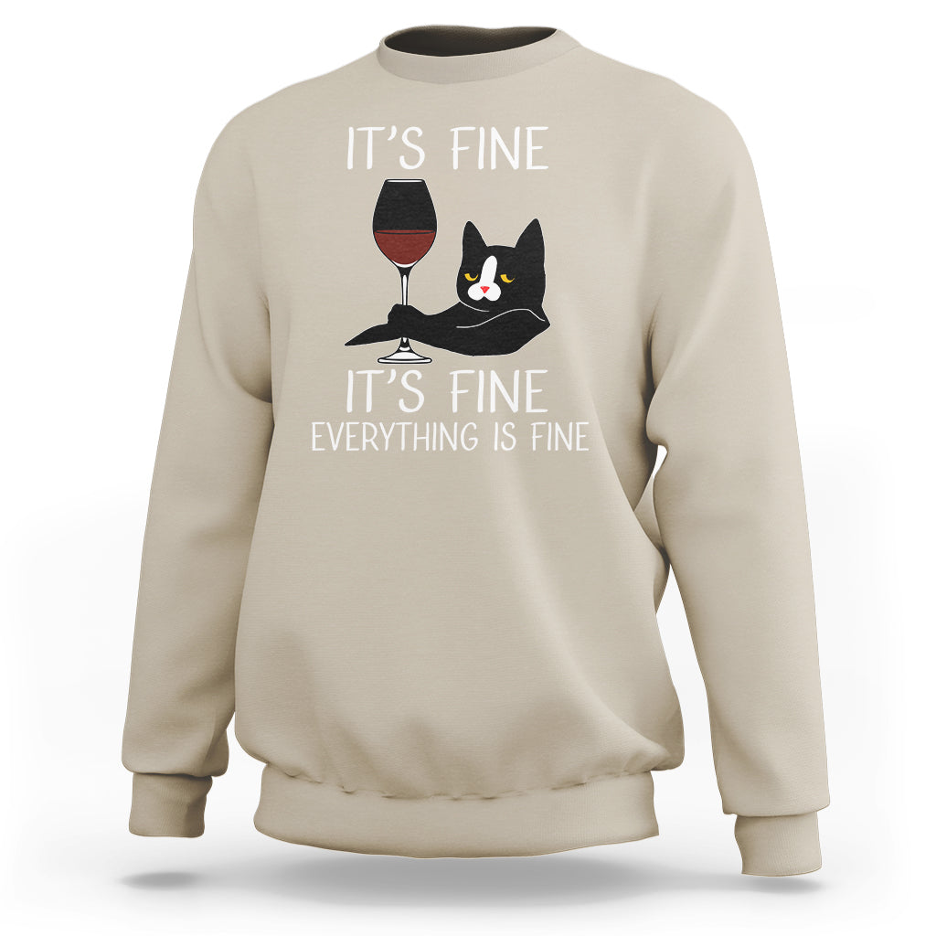 Sand crewneck cat lover sweatshirt with “It's fine” text and wine glass cat graphic