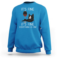 Sapphire blue crewneck cat lover sweatshirt with “It's fine” text and wine glass cat graphic