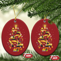 Set of red oval Christmas ornaments with yellow construction-vehicle tree design; FRONT and BACK