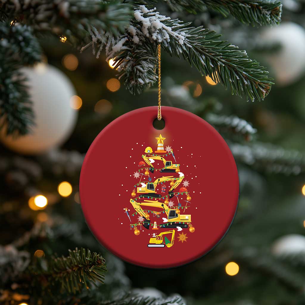 Red circular hanging Christmas ornament with yellow construction-vehicle tree and star