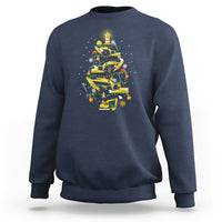 Navy crewneck sweatshirt with colorful monster-truck Christmas tree graphic