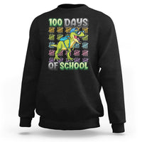 Boys black sweatshirt with 100 Days of School dinosaur graphic on front.