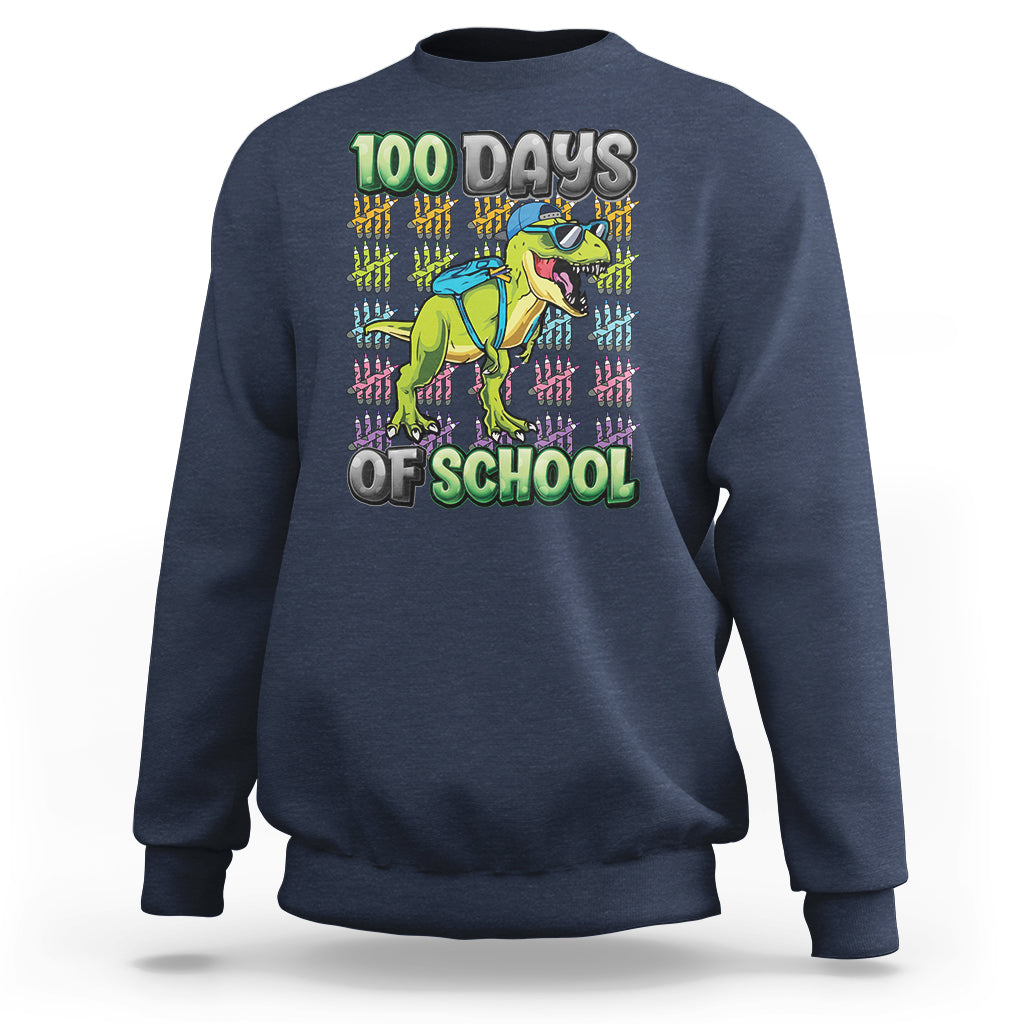Boys navy sweatshirt with 100 Days of School dinosaur graphic on front.