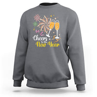 Charcoal gray crewneck sweatshirt with “Cheers to the New Year” fireworks and champagne glasses print