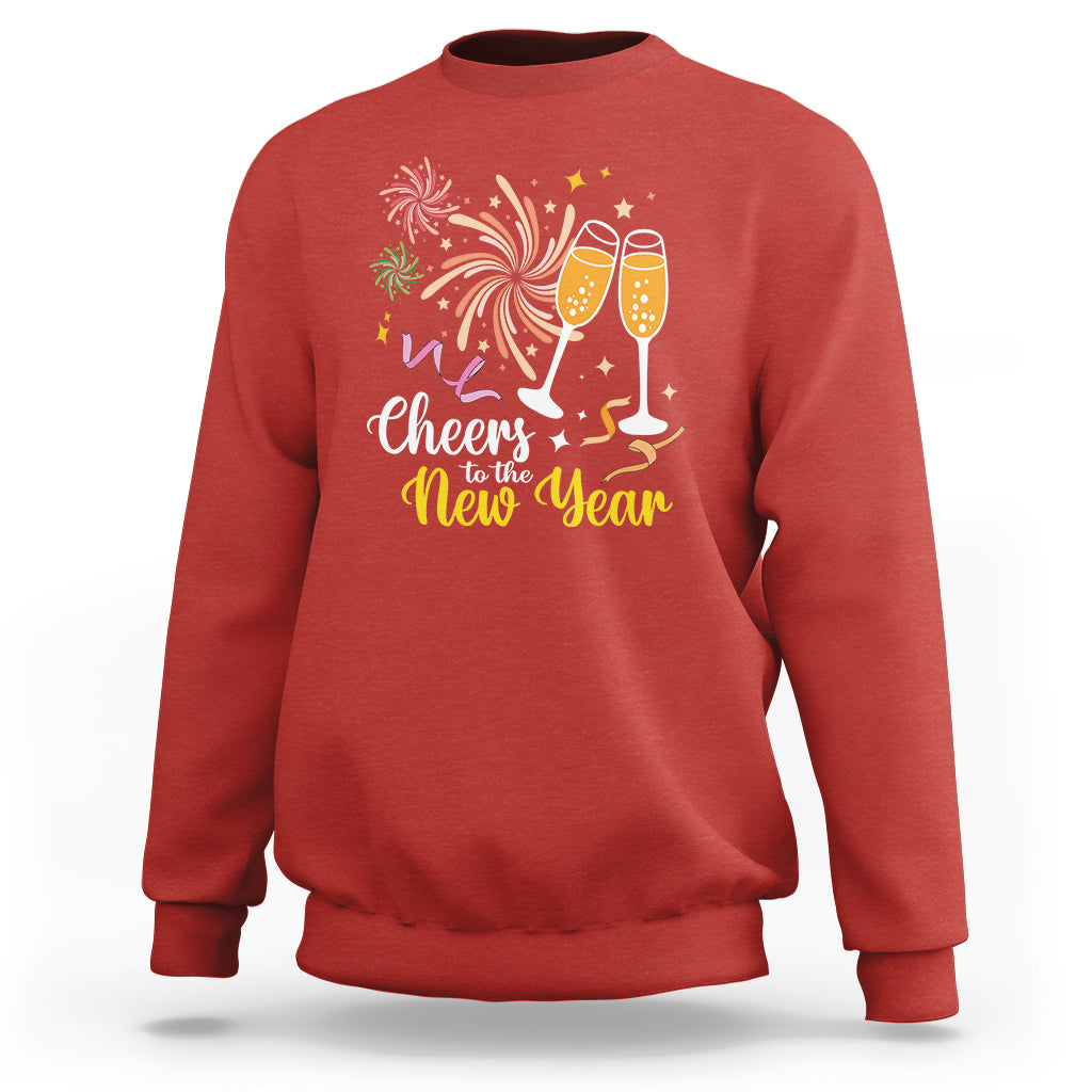 Red crewneck sweatshirt with “Cheers to the New Year” fireworks and champagne glasses print