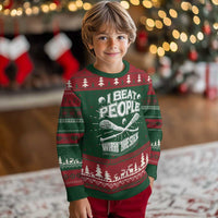 Green festive knitted sweatshirt with 'I Beat People' stick graphic
