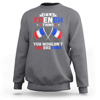 Heather gray crewneck sweatshirt with French-themed graphic print on chest