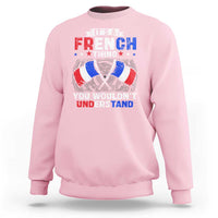 Light pink crewneck sweatshirt with French-themed graphic print on chest