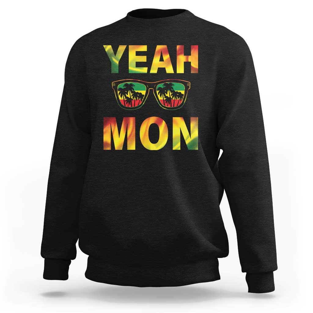 Black crewneck sweatshirt with 'YEAH MON' graphic and sunglasses print