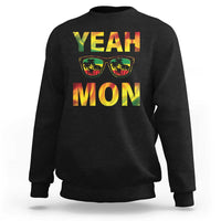 Black crewneck sweatshirt with 'YEAH MON' graphic and sunglasses print