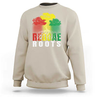 Sand color sweatshirt with multicolor tree and “Reggae Roots” logo graphic